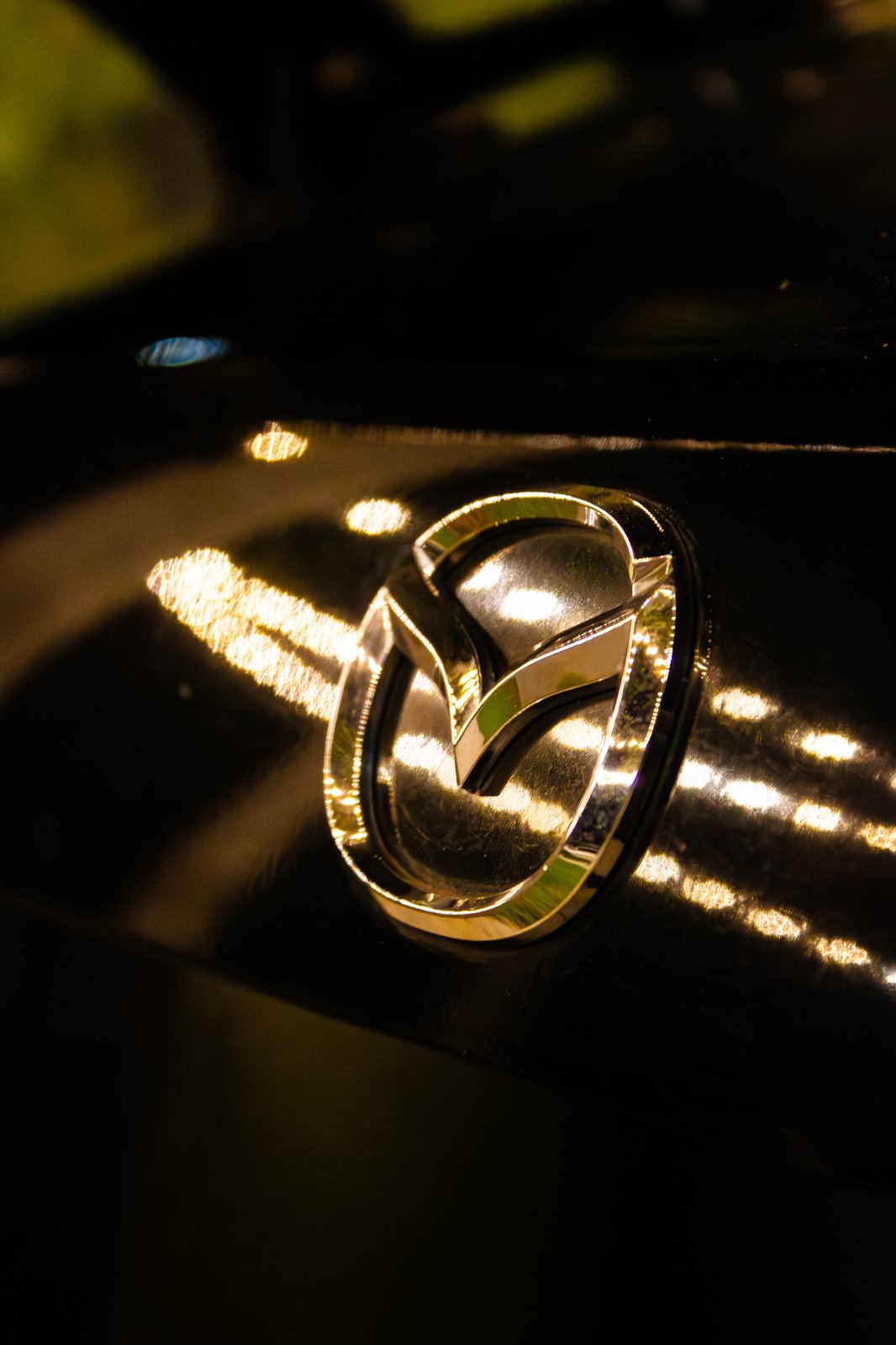 Forged wheel detail with Red Bull energy drink and lights — automotive lifestyle shot