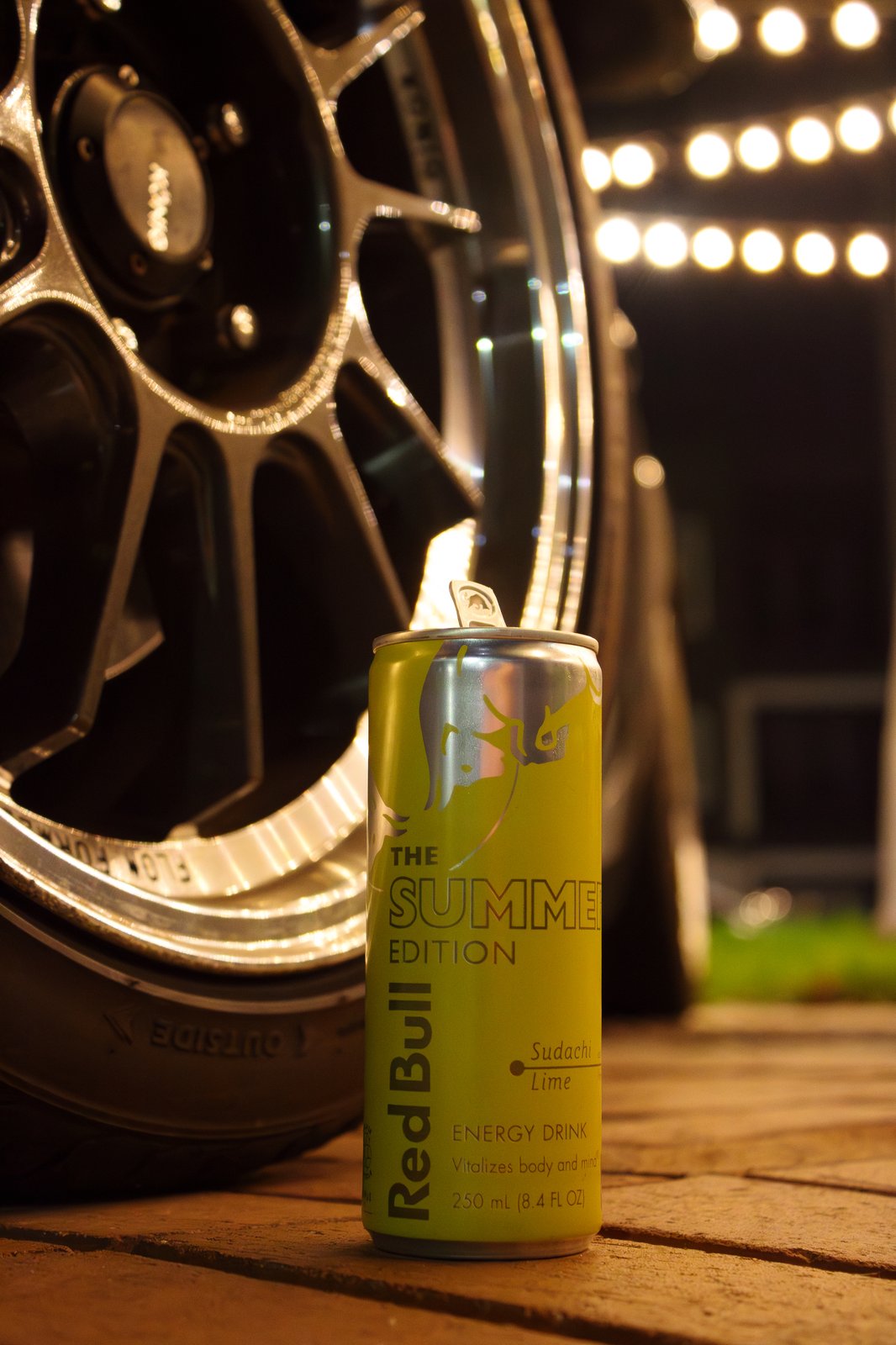 Red Bull Summer Edition can paired with forged wheel under string lights