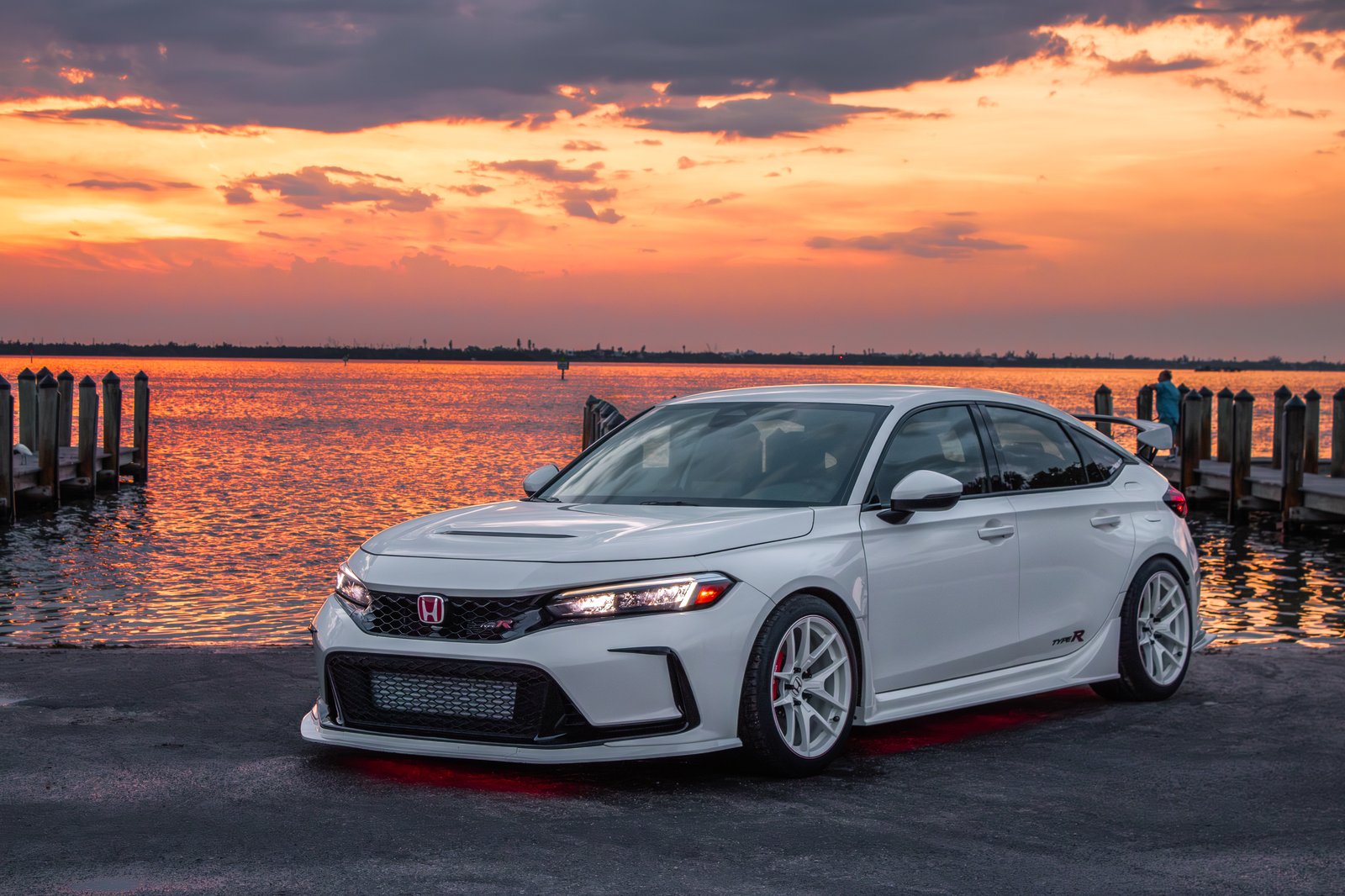 White Honda Civic Type R against vivid Florida sunset over the water — cinematic automotive photography